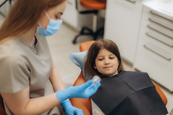 Should I Take My Child To A Kid Friendly Dentist In Glen Allen For White Spots On Teeth?